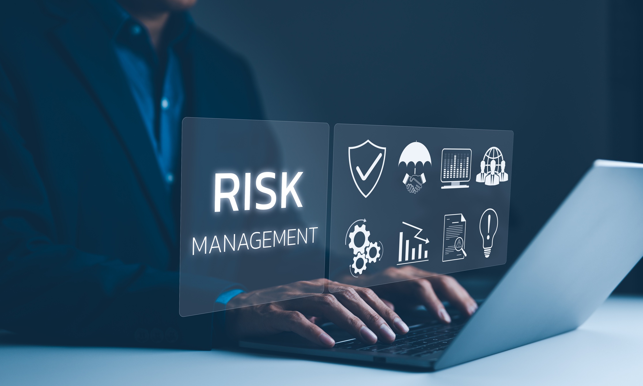 Corporate Risk Management Strategy Concept. A Businessman Is Analyzing A Virtual Risk Management Interface With Critical Strategy Icons On A Laptop Screen. Analyze Risk Assessment, Analysis Financial,
