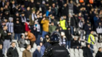 Special police unit at the stadium event secure a safe match against the hooligans