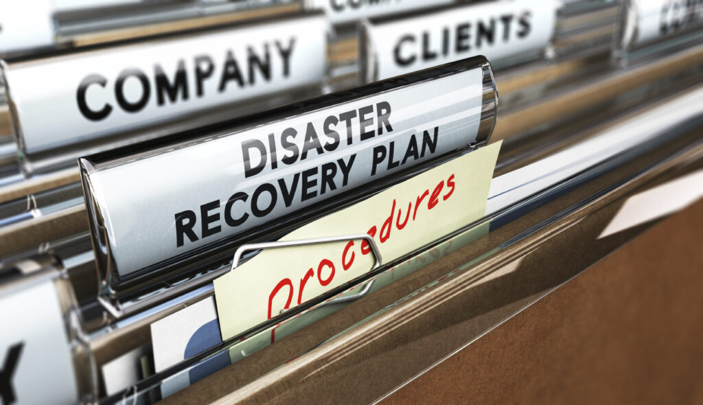 Disaster Preparedness Close up on a file tab with the text Distaster Recovery Plan, focus on the main text and blur effect. Concept image for illustration of DRP ans crisis communication.