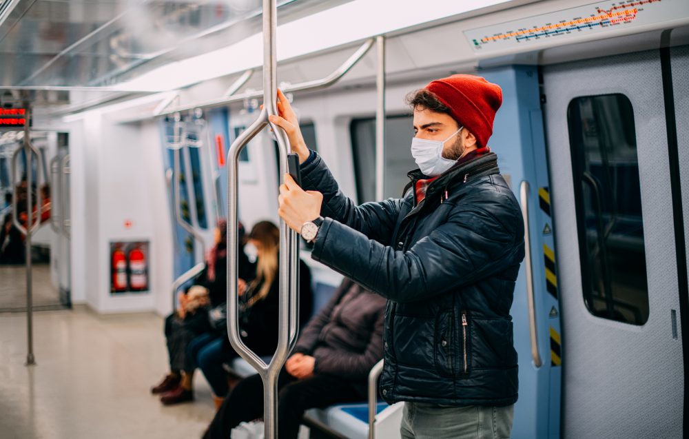 Man Wearing a Sterile Mask in the Subway