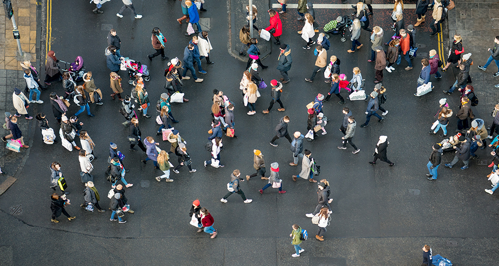 Pedestrian crowds crossing the street - photographed from directly above
