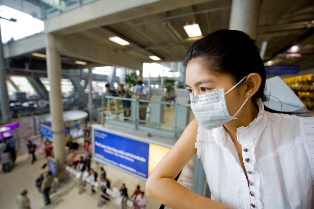 asian woman at the international airport in bangkok