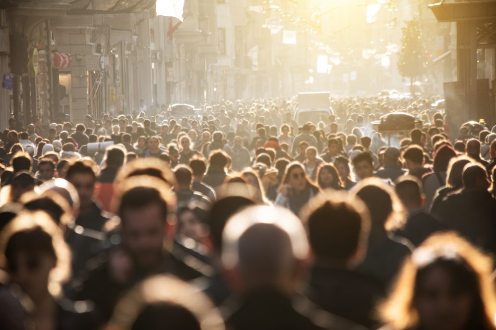 Blurred crowd of unrecognizable at the street