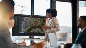 Woman in office giving presentation