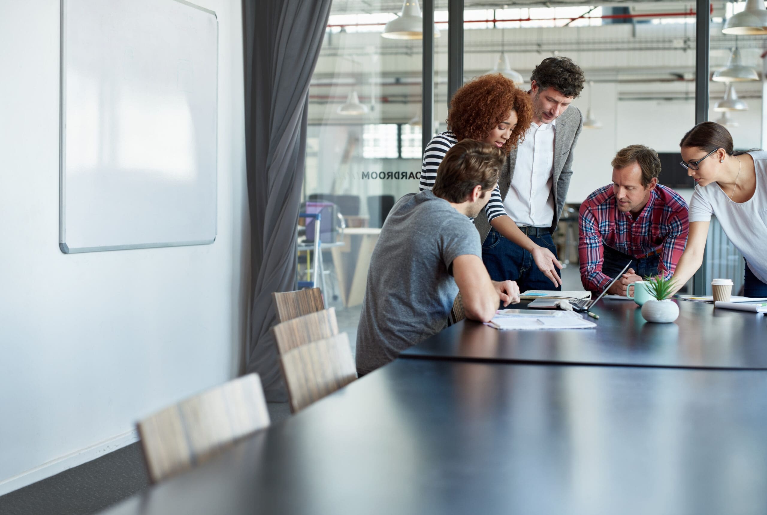 Boardroom discussing ESG disclosure regulations