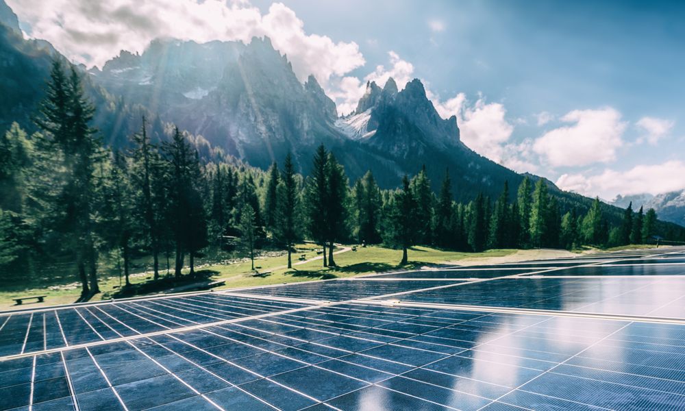 Solar Cell Panel In Country Mountain Landscape.