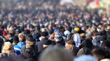 Crowd Of Anonymous People On Street In City Center